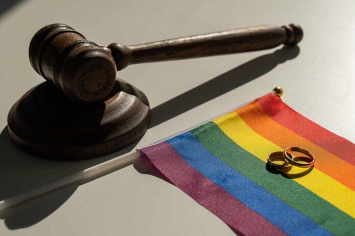 Legalization,Of,Same-sex,Marriages.,Rainbow,Flag,Wedding,Rings,And,Judge's