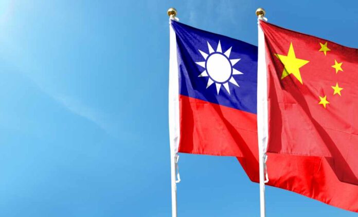 Taiwan,Flag,And,China,Flag,On,Cloudy,Sky.,Flying,In