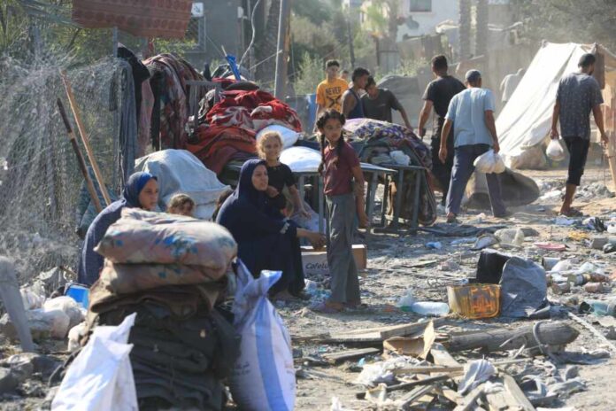 Palestinians,Inspect,Their,Destroyed,Homes,,After,An,Israeli,Airstrike,,Amid