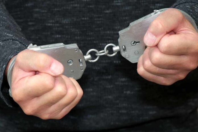 Closeup,Of,Hands,In,Handcuffs,,Representing,Arrest,Or,Detention,In