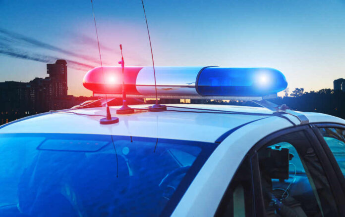 Police,Car,On,The,Street,Close,Up