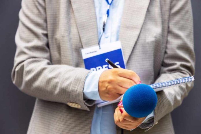 Journalist,Correspondent,Or,Reporter,With,Press,Pass,At,Media,Event,