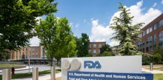 Exterior view of the FDA building with signage and trees