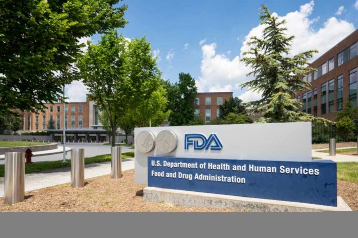 Exterior view of the FDA building with signage and trees