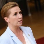 A female politician speaking at a government event