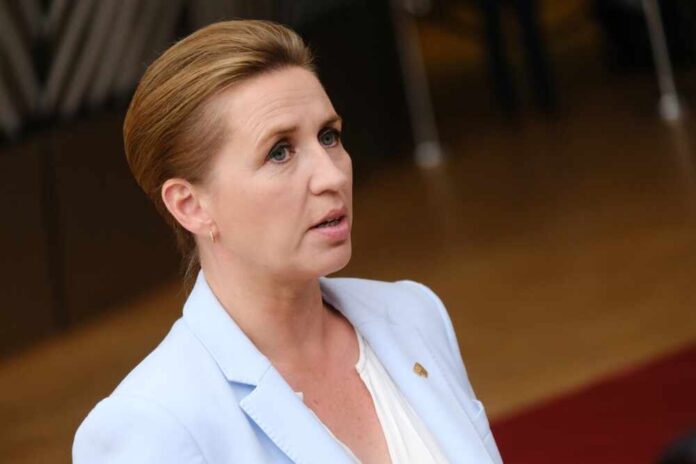 A female politician speaking at a government event