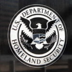 Seal of the U.S. Department of Homeland Security displayed on a building