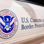 Close-up of U.S. Customs and Border Protection emblem on a vehicle