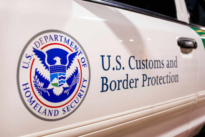 Close-up of U.S. Customs and Border Protection emblem on a vehicle