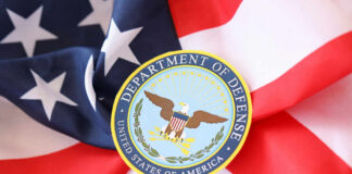 Department of Defense emblem on an American flag background
