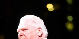 SHOCKING Praise for Shooter Sparks Debate A politician speaking into a microphone at an event