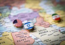 Trump’s Mixed Messaging FUELS MAGA Tensions Map of the Middle East with pins representing the USA, Israel, and Iran