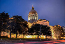 Trump’s Endorsement SAVES GOP’s Fragile Majority State capitol building illuminated at night with a prominent dome