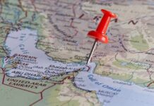 Crisis in the Gulf: Is Iran Planning Counterattacks? A red pushpin on a map of the Middle East highlighting a specific location