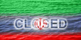 Graphic representation of the word 'CLOSED' overlaid on the Iranian flag with a water background