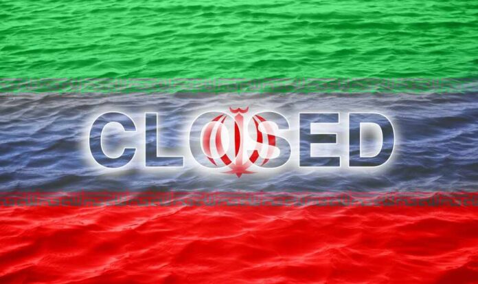 shutterstock_2754107273.jpg Graphic representation of the word 'CLOSED' overlaid on the Iranian flag with a water background