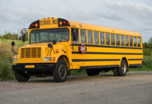 A yellow school bus parked on a road