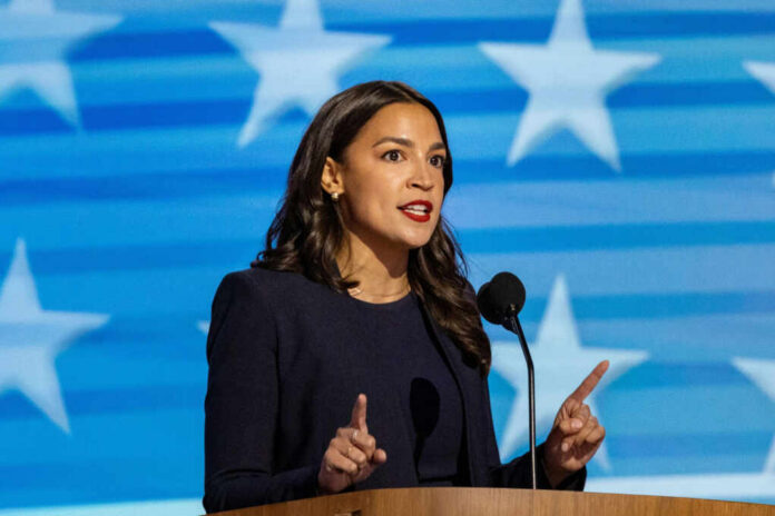 A female politician delivering a speech at a podium with a star-patterned background