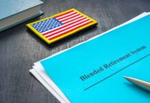 Blended Retirement System document with an American flag patch and a pen