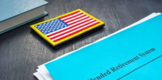 Blended Retirement System document with an American flag patch and a pen