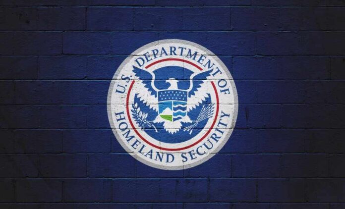 Picture,Of,A,The,Flag,Of,The,Department,Of,Homeland Logo of the U.S. Department of Homeland Security on a blue wall