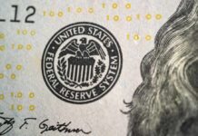 The Fed Just Got a New Boss—and a Warning! Close-up of a United States dollar bill featuring the Federal Reserve System seal