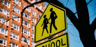 NYC Schools Face Massive Enrollment PLUNGE School zone sign indicating pedestrian safety for children