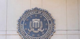 FBI seal mounted on a wall, representing the Federal Bureau of Investigation