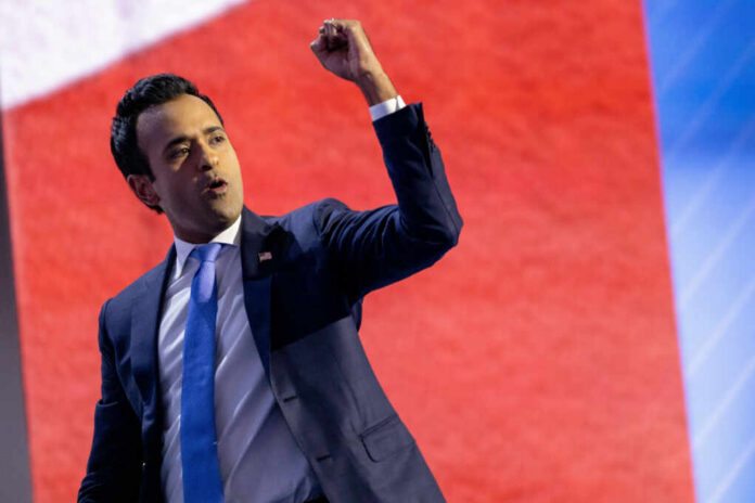 A speaker passionately delivering a speech with a raised fist