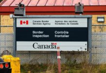 Sign for Canada Border Services Agency indicating border inspection