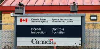 Sign for Canada Border Services Agency indicating border inspection