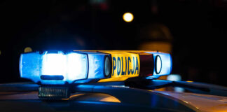 Massive Hunt in Romania: Boy Comes Home Safe Police car light bar glowing at night