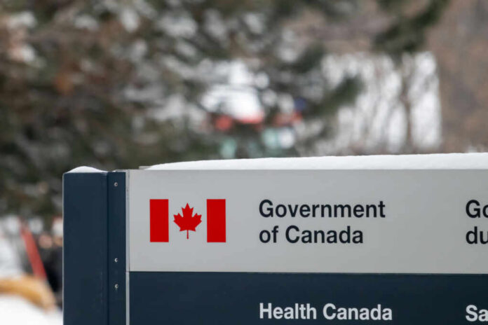 Sign for the Government of Canada featuring the national flag and Health Canada