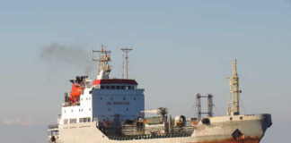 A cargo ship sailing on the ocean