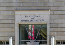 Fake Family Trick Turns Children Into Cargo Facade of the U.S. Customs and Border Protection building with signage