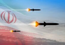 Iran Still Holds Massive Missile Threat Three missiles launching against a backdrop of the Iranian flag