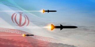 Iran Still Holds Massive Missile Threat Three missiles launching against a backdrop of the Iranian flag