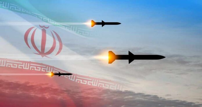 Fired,Missiles,Fly,To,The,Target.,Missiles,At,The,Sky Three missiles launching against a backdrop of the Iranian flag