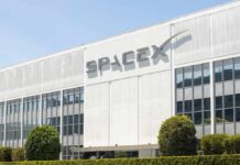 SpaceX Just Made Market History Exterior view of the SpaceX building with a prominent logo