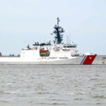 U.S. Coast Guard patrol vessel navigating through the ocean