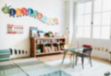 Predator Politician Tied To Daycare Abuse A bright and colorful children's room with a bookshelf and a play table