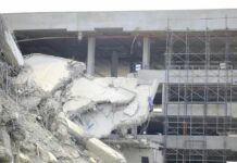 7.8 Shocker: Streets Turn To Rubble Damaged building structure with exposed debris and scaffolding