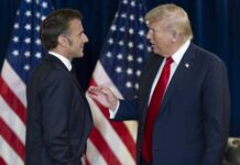Why The Trump-Macron Claim Is Under Fire Two political leaders engaging in conversation with flags in the background