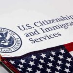 U.S. Citizenship and Immigration Services document with American flag