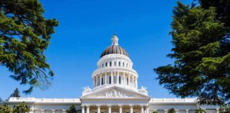 Congress’ New Ethics Plan Faces Questions State capitol building with white dome and columns framed by trees