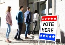 Why Congress Wants Tougher Voting Laws voters lining up at a polling place entrance