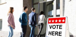 Why Congress Wants Tougher Voting Laws voters lining up at a polling place entrance