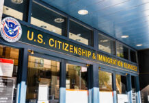 Green Card Rules Face Major Overhaul Entrance of the U.S. Citizenship and Immigration Services office with signage