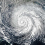 Satellite image of a hurricane swirling over the ocean