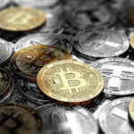 A collection of various cryptocurrency coins including Bitcoin and Tether